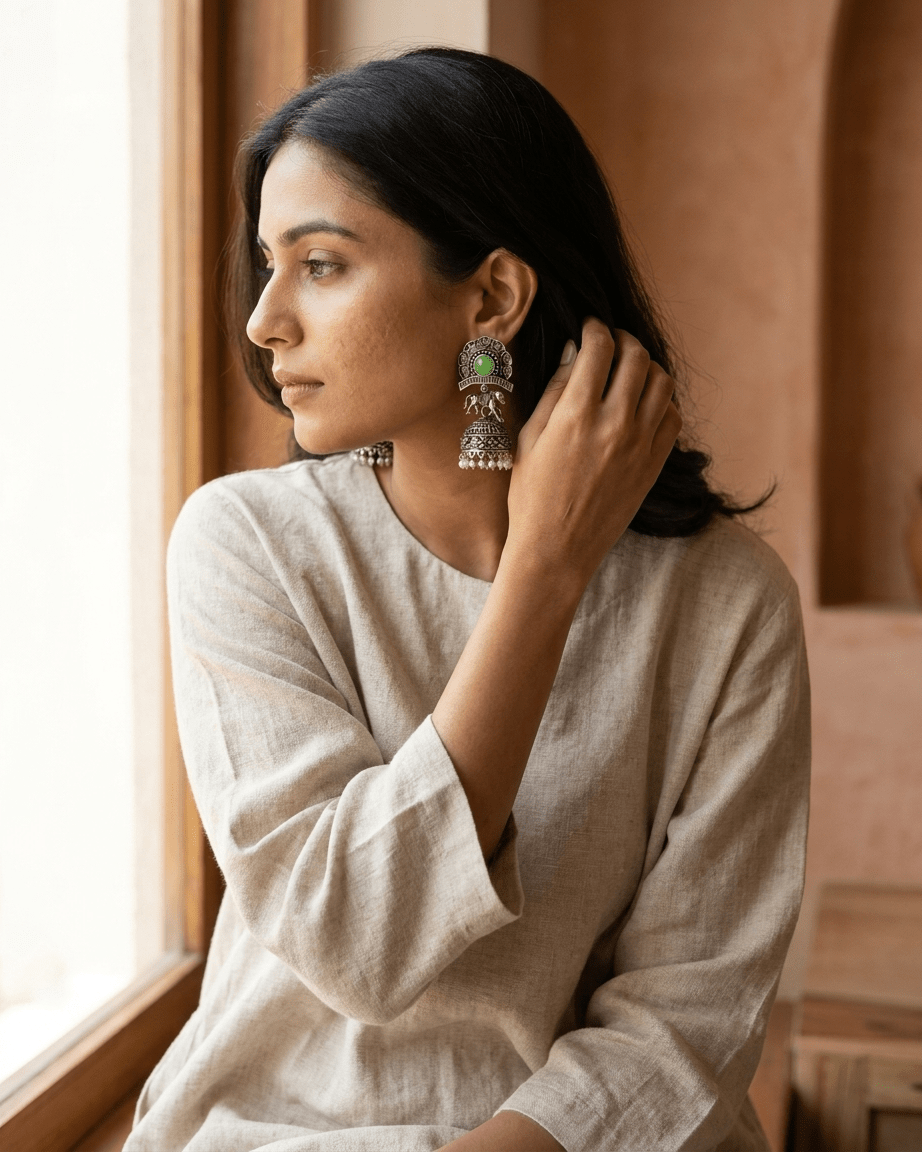 Oxidized Silver Green Stone Jhumka Earrings - LozziOxidized Silver Green Stone Jhumka EarringsEarrings